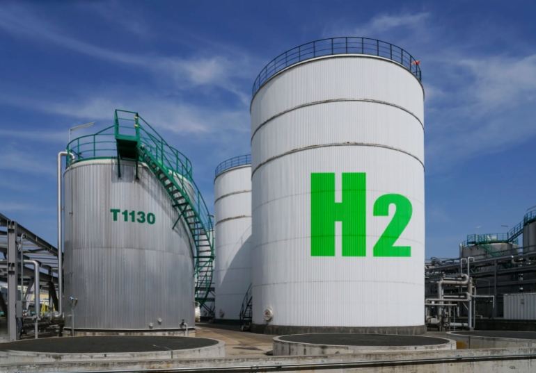 Hydrogen Tanks at chemical refinery - stock photo